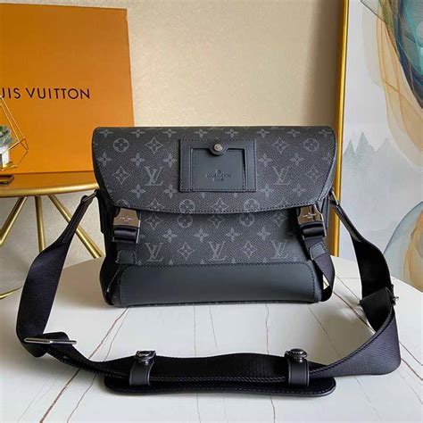 Messenger Voyager PM Monogram Eclipse Canvas.